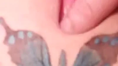 Impotent guy fingers his mistress's well-groomed pussy; she has a pubic tattoo