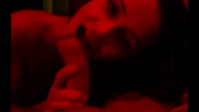 Young beauty giving a blowjob